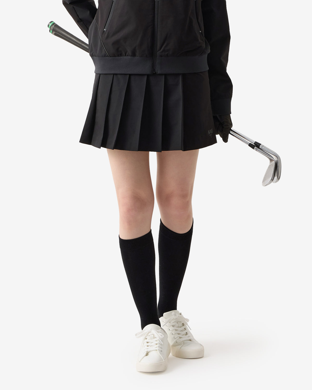 PERFORMANCE PLEATED SKIRT