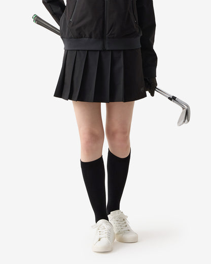 PERFORMANCE PLEATED SKIRT