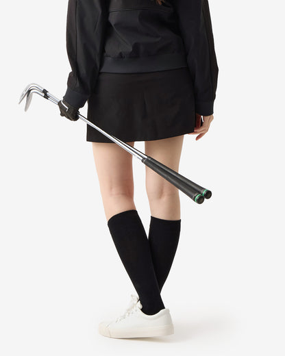 PERFORMANCE PLEATED SKIRT