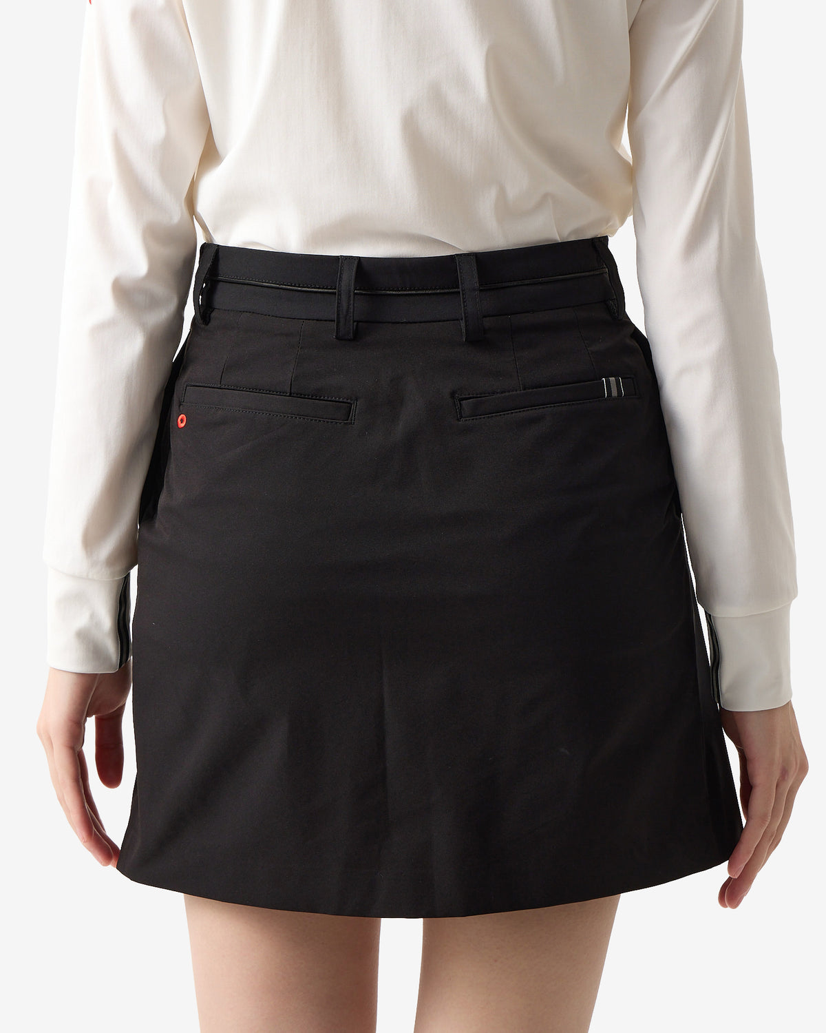 PERFORMANCE PLEATED SKIRT