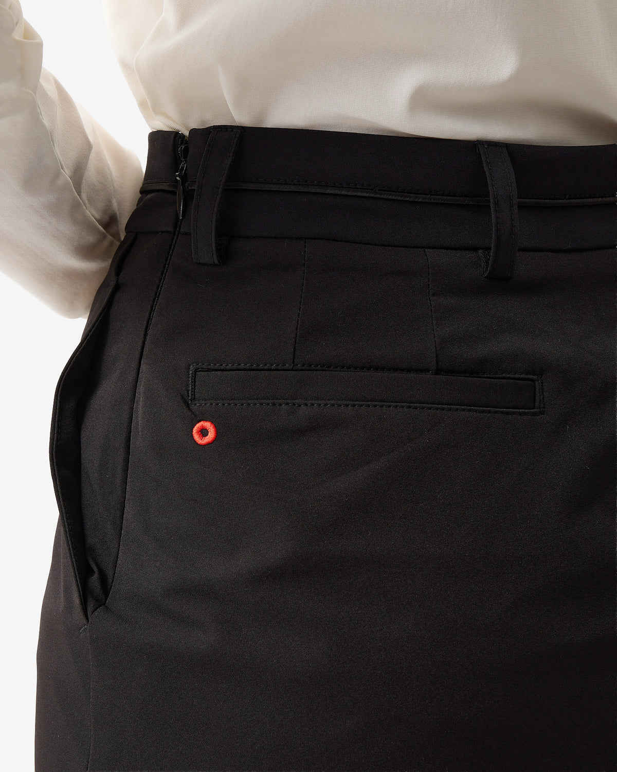 PERFORMANCE PLEATED SKIRT