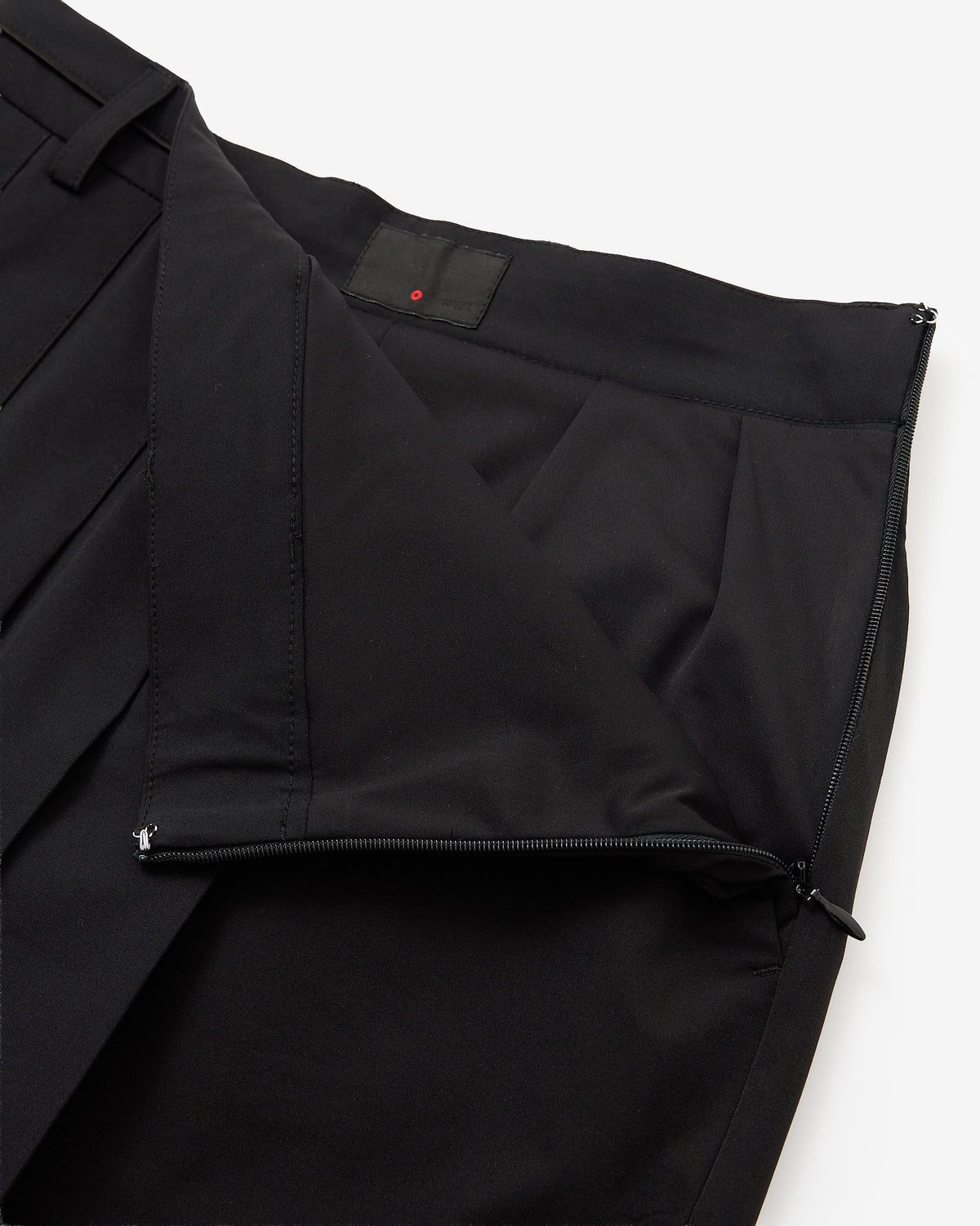 PERFORMANCE PLEATED SKIRT