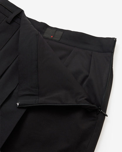 PERFORMANCE PLEATED SKIRT