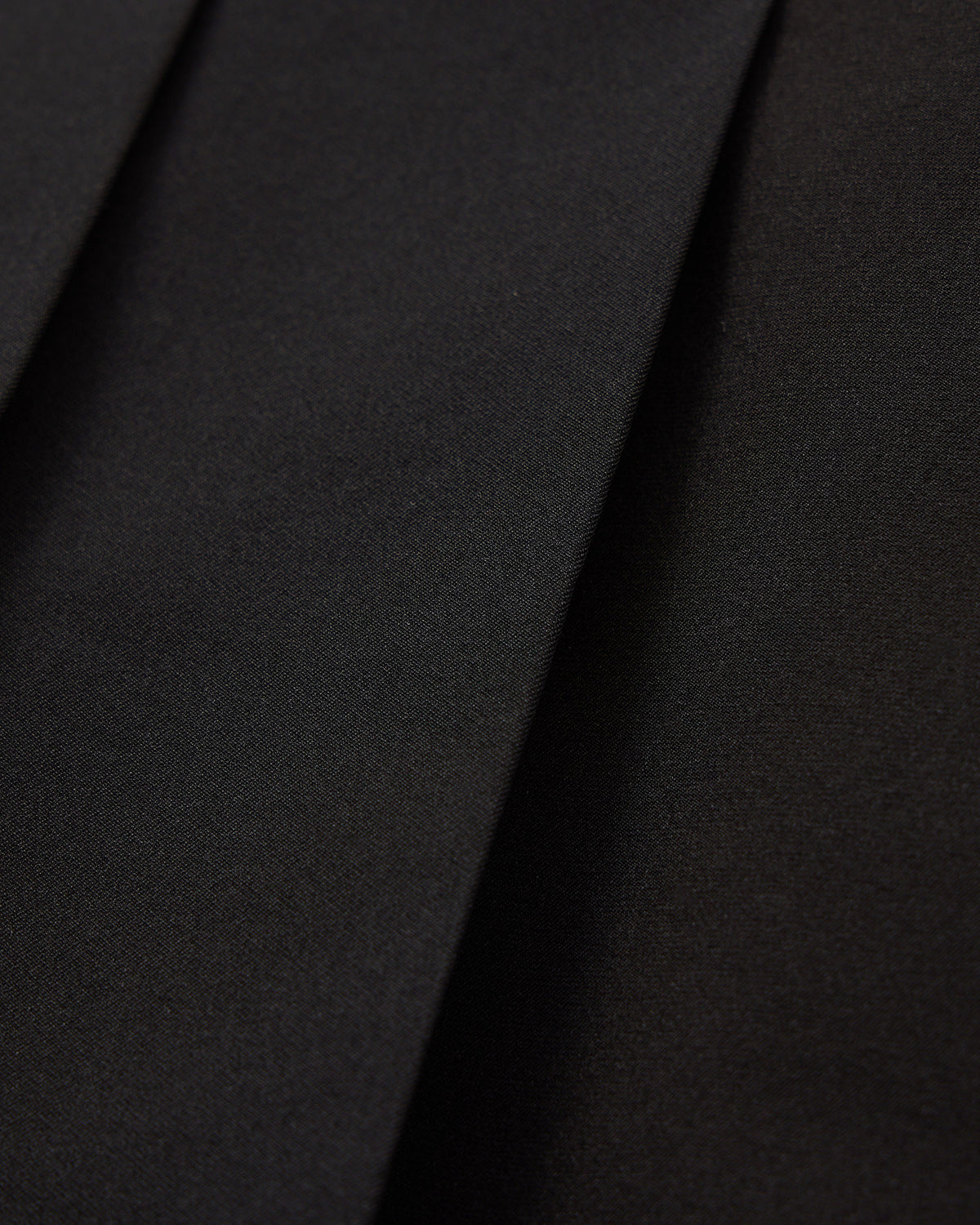 PERFORMANCE PLEATED SKIRT