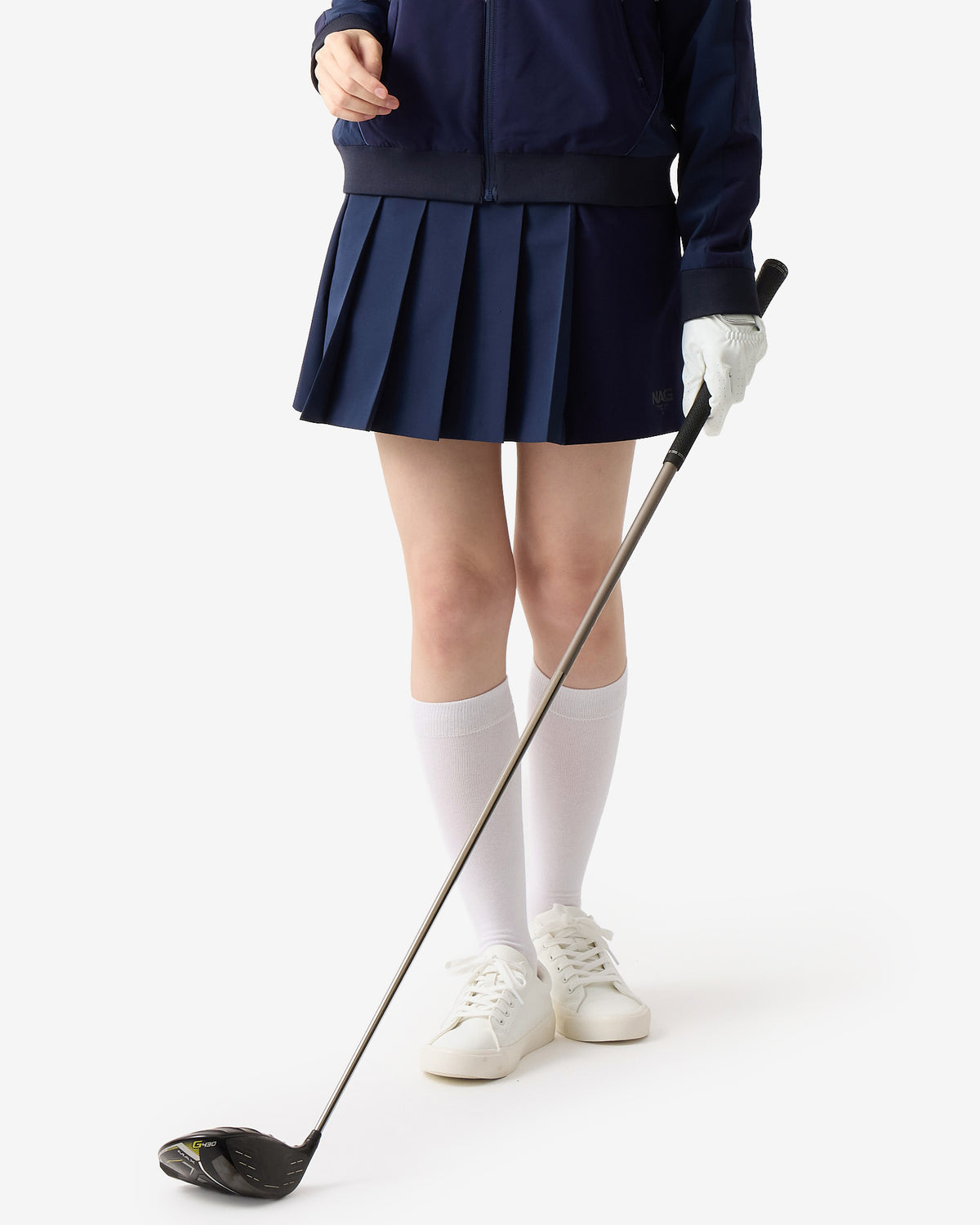 PERFORMANCE PLEATED SKIRT