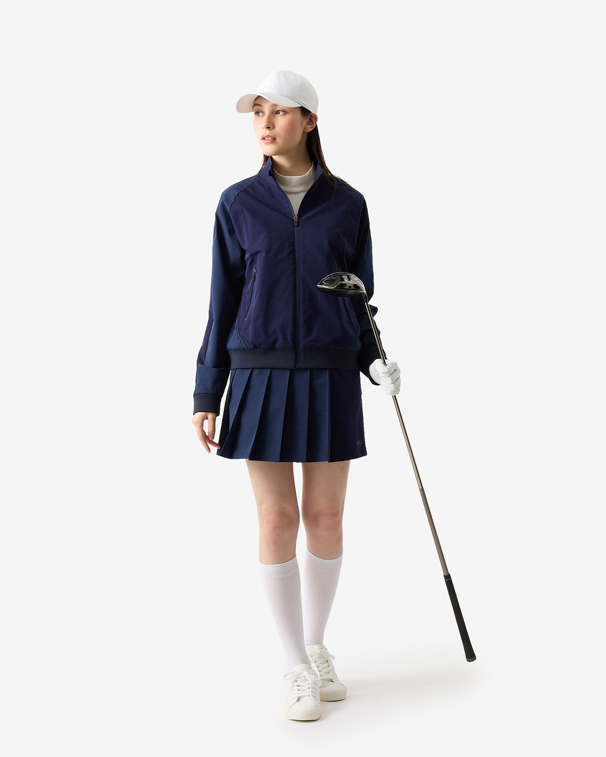 PERFORMANCE PLEATED SKIRT