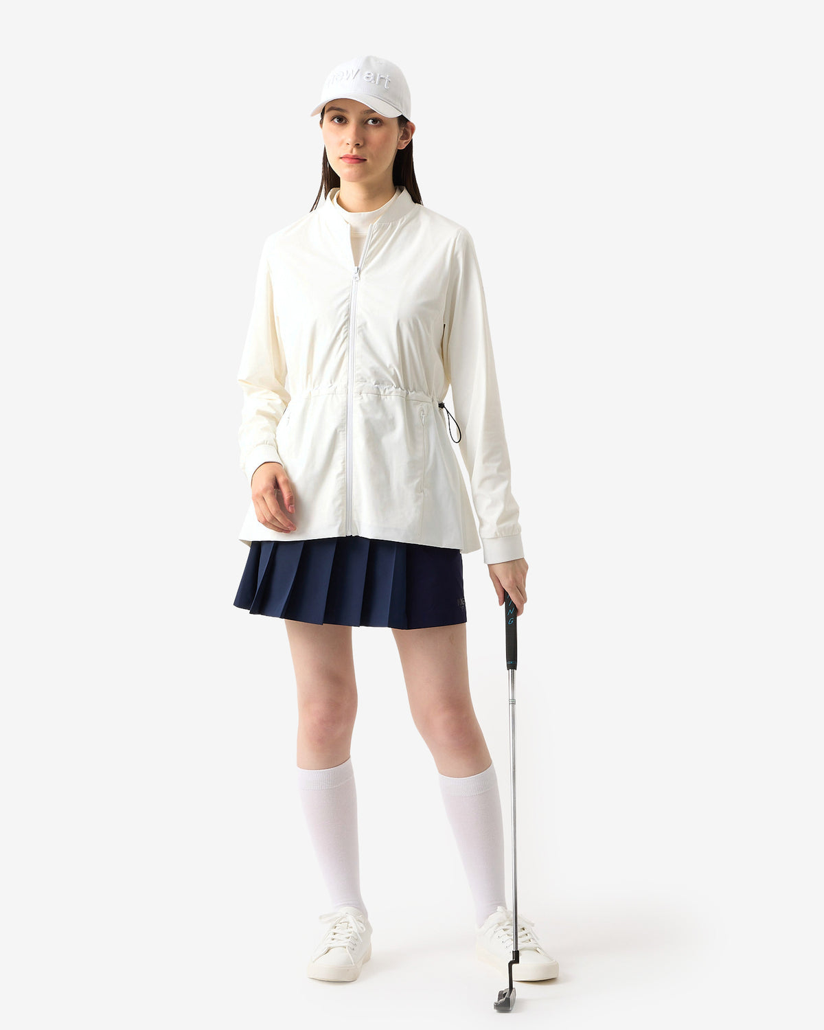 PERFORMANCE PLEATED SKIRT