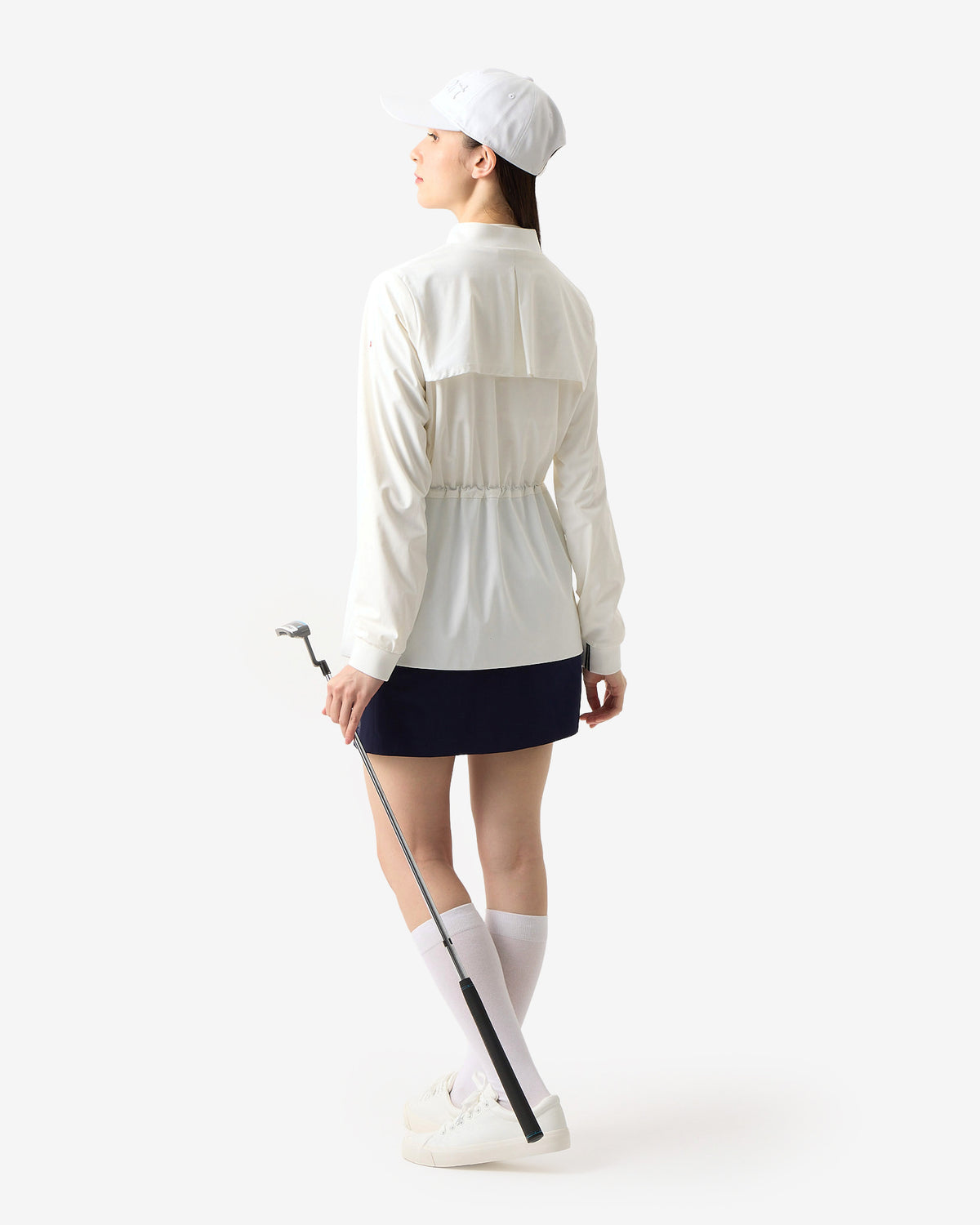 PERFORMANCE PLEATED SKIRT