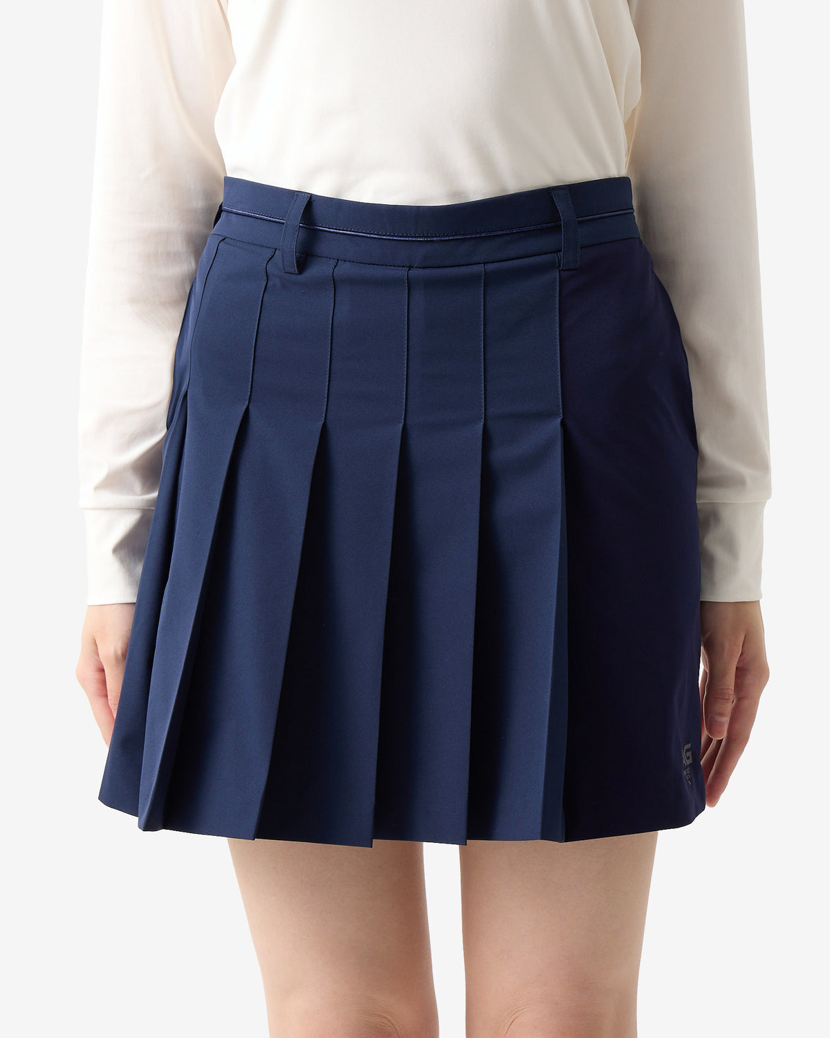 PERFORMANCE PLEATED SKIRT