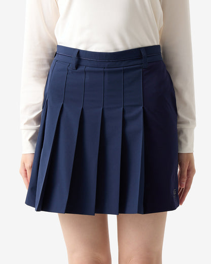 PERFORMANCE PLEATED SKIRT