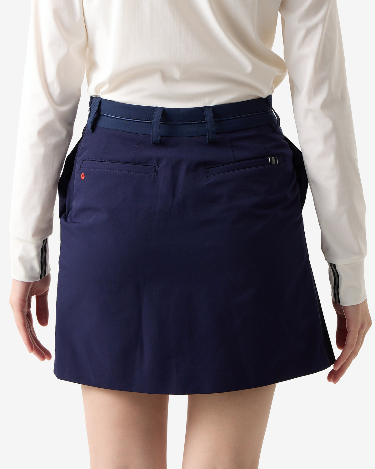 PERFORMANCE PLEATED SKIRT