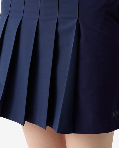 PERFORMANCE PLEATED SKIRT