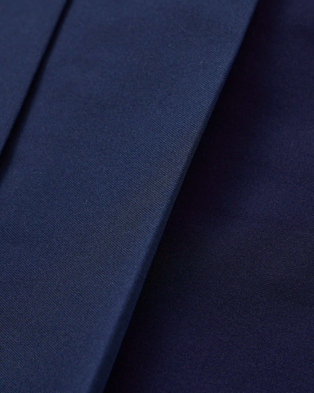PERFORMANCE PLEATED SKIRT